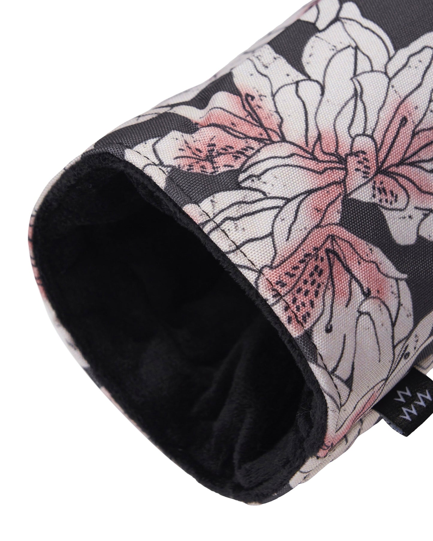 Detail of an azalea print driver headcover featuring pink and white flowers and a black inner velvet lining.