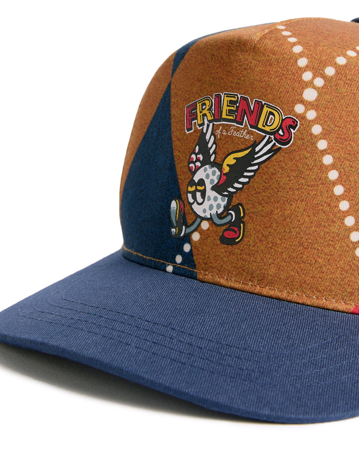 Argyle snapback cap featuring a winged golf ball graphic and the text Friends of a Feather above.