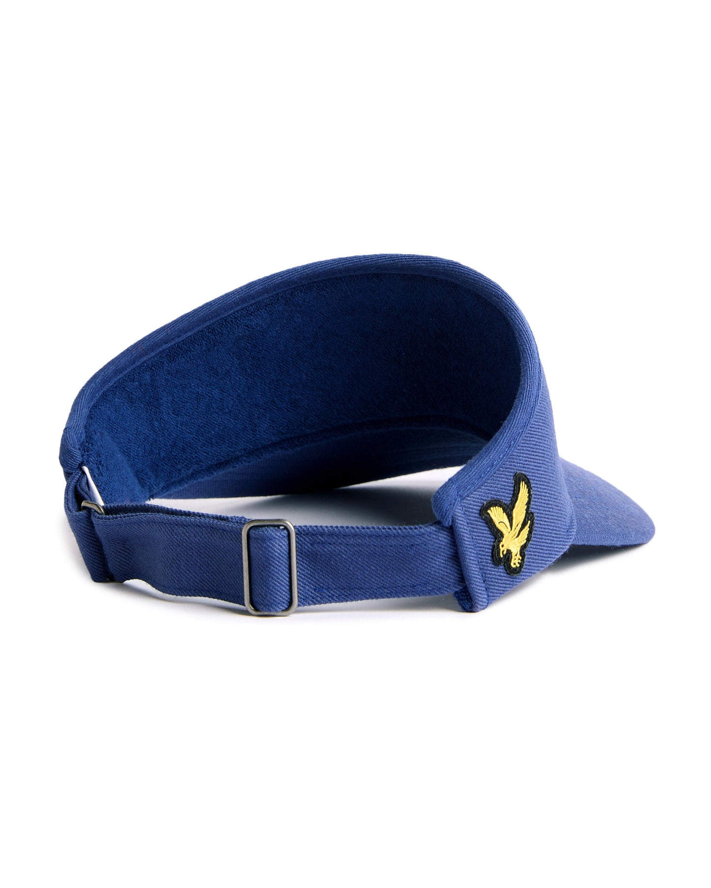 Back of a navy visor featuring an adjustable strap with a metal buckle and a yellow eagle logo patch.