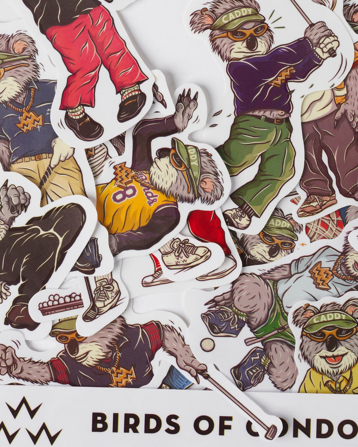 White stickers featuring illustrated koalas in golf gear and retro outfits.