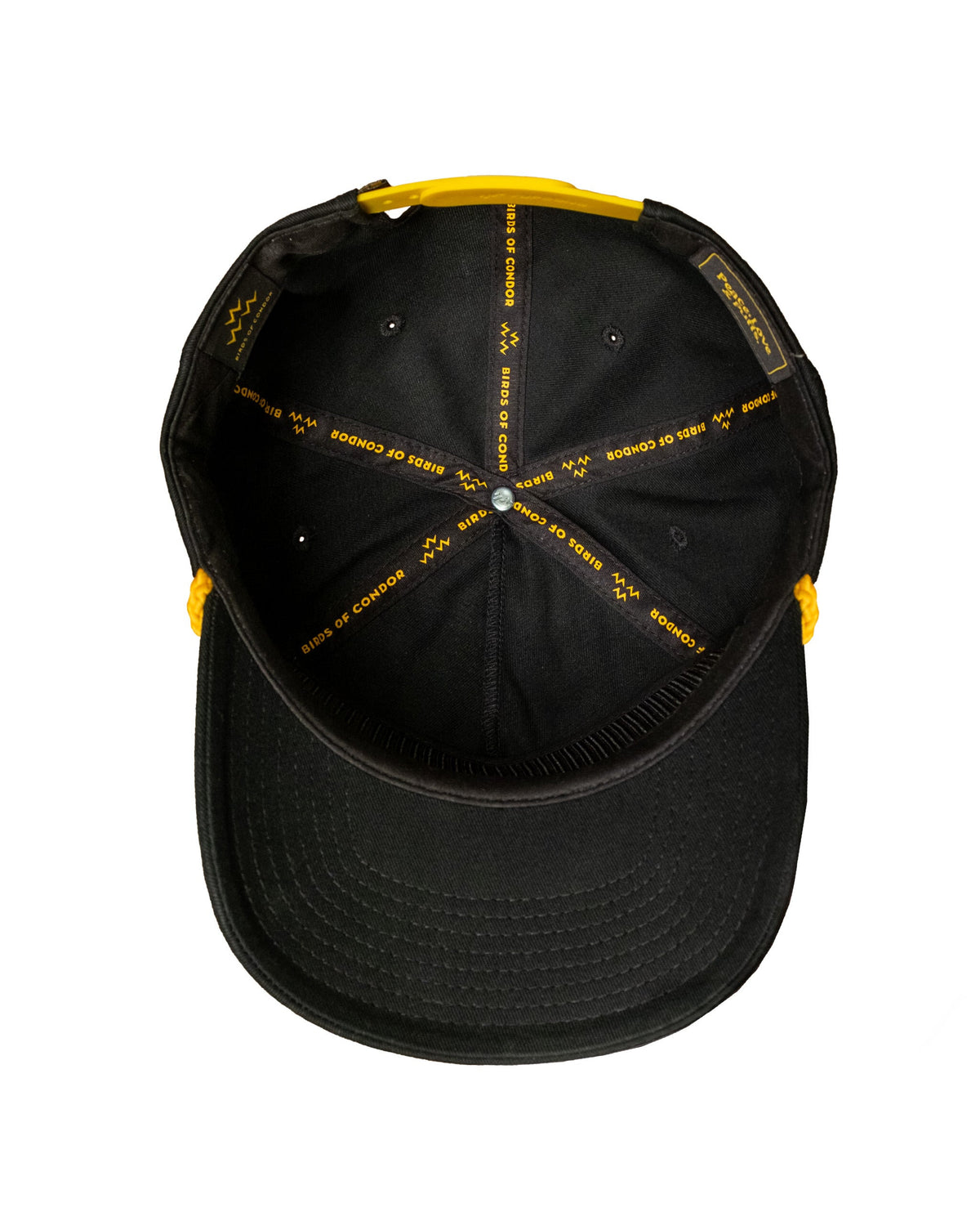 Inside view of a black snapback cap featuring yellow internal taping, yellow contrast snapback closure, and a brim.