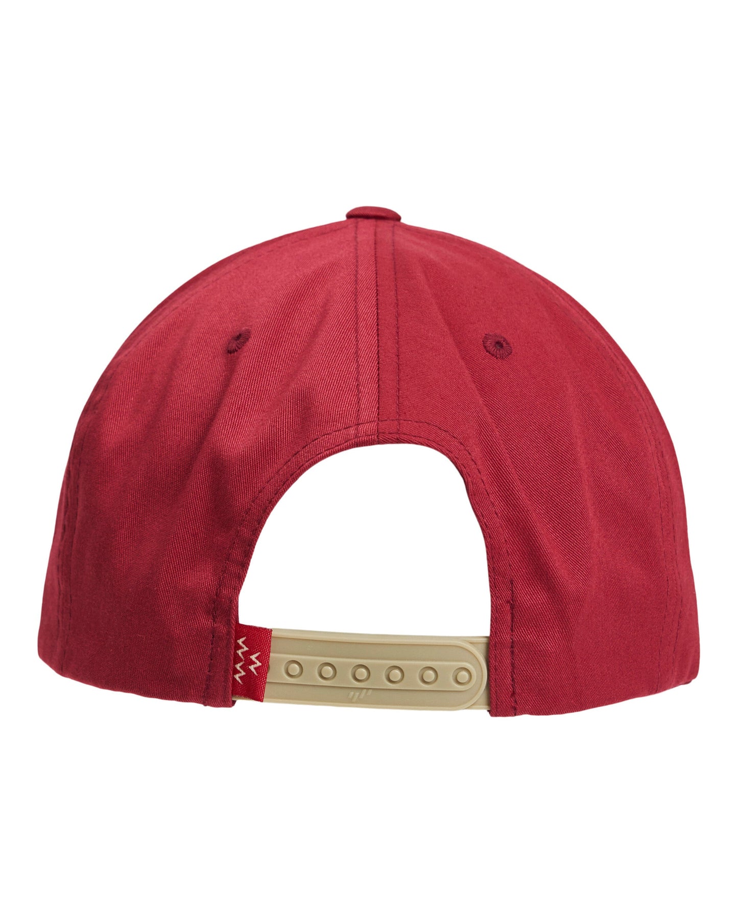 Back of a burgundy snapback cap with an adjustable plastic cream strap and a small red tag.