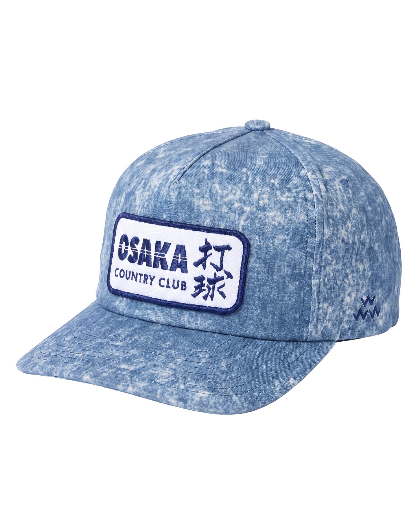 A blue acid-wash baseball cap featuring a white rectangular patch on the front with 'OSAKA COUNTRY CLUB' and Japanese characters, set against a plain white background.