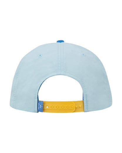 Back of a sky blue nylon snapback cap with a yellow plastic closure and a small blue tag with a graphic.